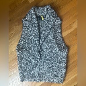 Karen Kane open vest.  Label states XS but also fits small.  It’s open design.